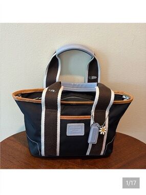 Coach Hampton  mini tote  navy canvas/ tan & Lt blue leather trim
Vinyl interior